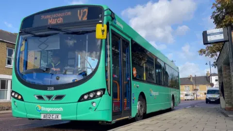 BBC Bus at a bus stop