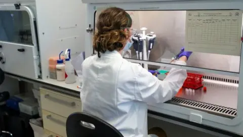 Reuters Laboratory worker at the Oxford Vaccine Group's facility