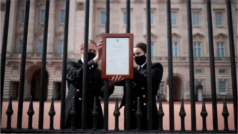 Reuters A notice announcing Prince Philip's death is attached to the gates at Buckingham Palace