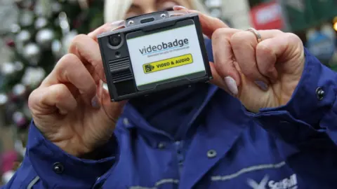 PA ScotRaill worker with CCTV camera