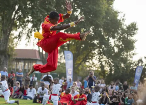 Getty Images Someone jumping at Chinese Lunar New Year event in Johannesburg, South Africa - Saturday 4 February 2023