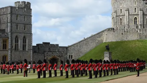 PA Media The Guardsmen showed their precision marching skills while maintaining a social distance of just over two metres