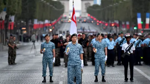 AFP Singaporean troops parading in the boulevard