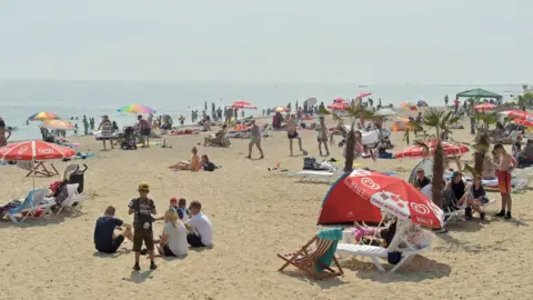 PA People on the beach at Clacton-on-Sea