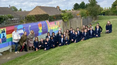 @NorthamptonHigh Northampton High pupils at the Hardingstone Jubilee mural