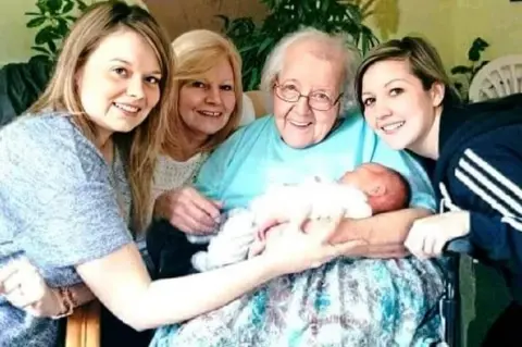 FAMILY HANDOUT Irene Garbett with family