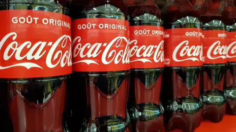 EPA Coca-Cola bottles on sale at a supermarket in Nice, France (20 January 2020)