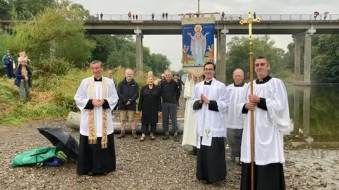 Priests at the launch of the sculpture