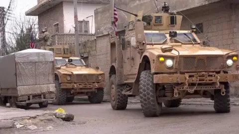 AFP US military armoured vehicles in Manbij, northern Syria (16 January 2019)