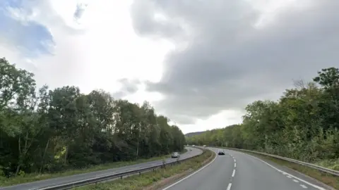 Stretch of A40 closed after lorry overturns