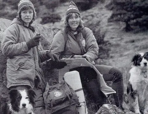 Penny Kirby Old black and white picture of two women and two collies