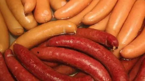 Getty Images Bockwurst and krakauer sausages simmer in hot water at a stand at the International Green Week agricultural trade fair (Internationale Gruene Woche) on January 16, 2015 in Berlin, Germany.