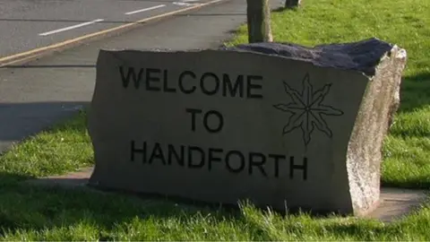 Terry Walsh/Geograph Welcome to Handforth sign