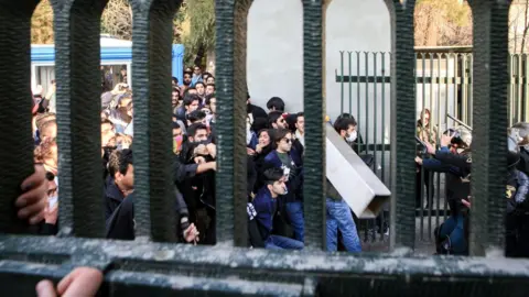 Iran protests continue for a third day despite warnings
