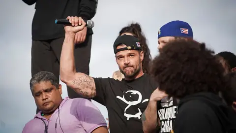 AFP Rick Martin attends march in Puerto Rico