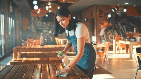 Getty Images Pub worker