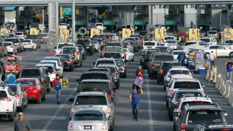 Reuters . border patrol officers to enter from Mexico into the U.S., at the San Ysidro point of entry, in Tijuana