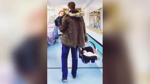 Family image Going home: Elis leaves hospital with Aron and Seth