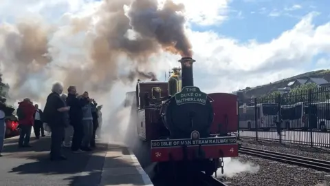 BBC Train decorated with 150 banner