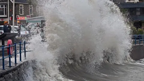 Gareth Davies Waves hitting the seafront in Saundersfoot