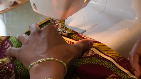 BBC Woman sewing