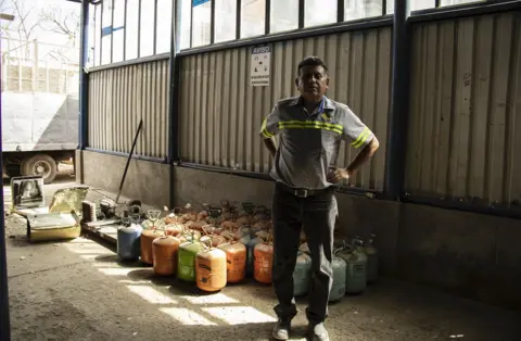 BBC Angel with canisters of refrigerant gases