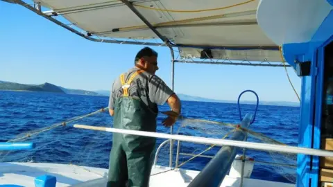 Giannis Athinaios Fisherman off the coast of Greece