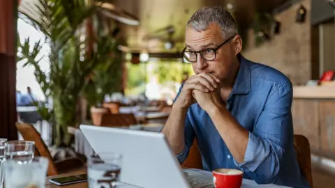 Getty Images Worried businessman