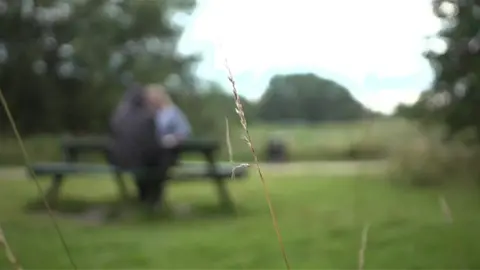 Christine speaking a BBC reporter