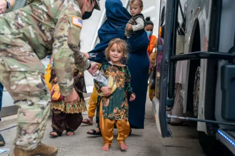 Getty Images Afghan refugees arriving in the US in August