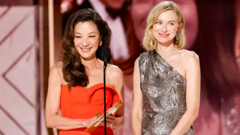 Getty Images Michelle Yeoh and Naomi Watts at the 81st Golden Globe Awards held at the Beverly Hilton in Beverly Hills, California on Sunday, January 7, 2024