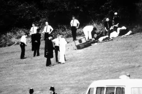 PA Media Forensic experts search Wild Park on 11 October 1986