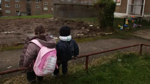 Getty Images Children in a deprived area