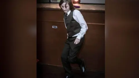 Family handout John James Ritchie-Wilson, known as JJ, dancing