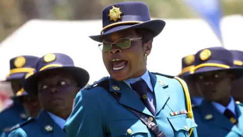 EPA A female police officer during a passing out parade in Harare, Zimbabwe - Thursday 15 November 2018