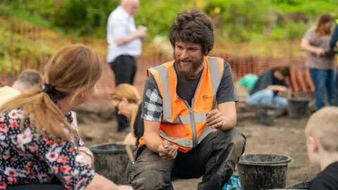 AFP Dr Colin Elder from the University of Salford talks through some of the find