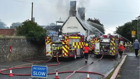 David Worth Crews fighting the fire in Fordham