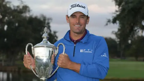 Charles Howell III celebrates winning the RSM Classic