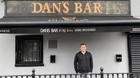 Gerard Keenan Gerard Keenan out the front of his pub, Dan's Bar