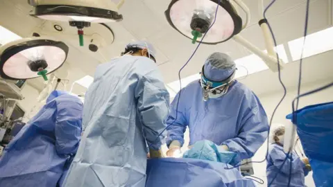 Getty Images surgeons in theatre