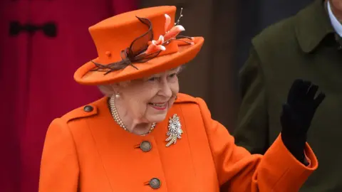 PA The Queen waved to the crowd after the service