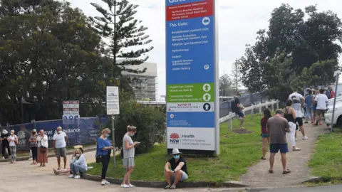 EPA People line up for testing at walk-in clinic in Sydney's Northern Beaches region