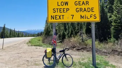 Antony Butcher Antony Butcher's bicycle leaning against a sign