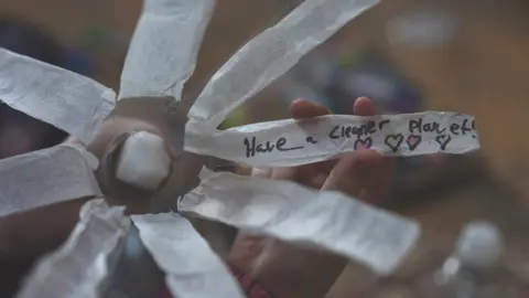 Rachel Palmer Image of some artwork about climate wishes - it reads "have a cleaner planet"