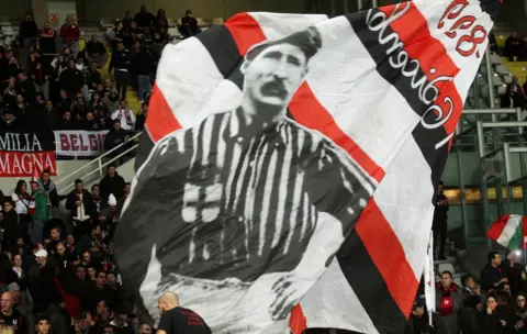 Getty Images Herbert Kilpin on a banner