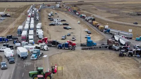 Canadian Press A lorry convoy blocks the US-Canada border near Coutts, Alberta