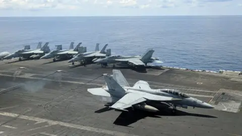 AFP The USS Ronald Reagan as it sails through the South China Sea