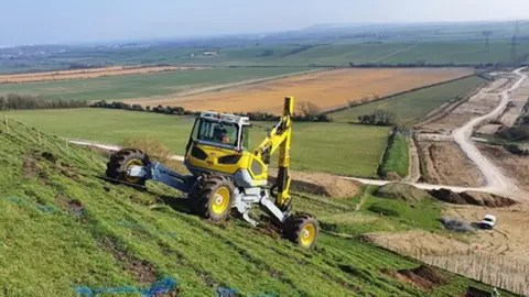 National Grid National Grid spider digger at work in Dorset AONB