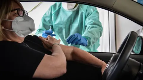 EPA A drive-through vaccination centre in Italy