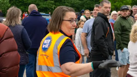 Matthew Blackwell People waiting for water